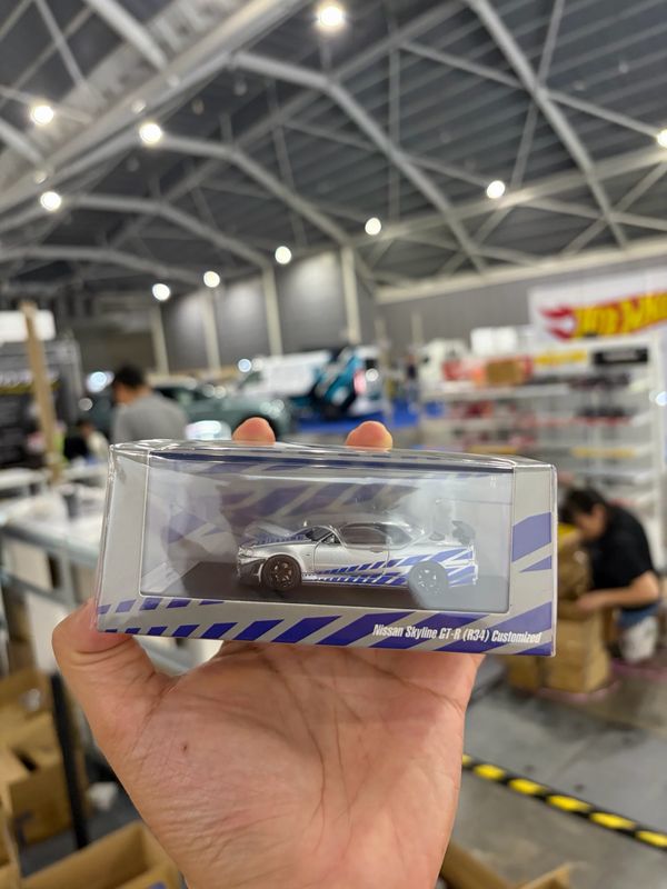 Motorhelix Nissan Skyline GT-R (R34) Customized Silver-Blue Livery | 2026 Singapore Auto Expo