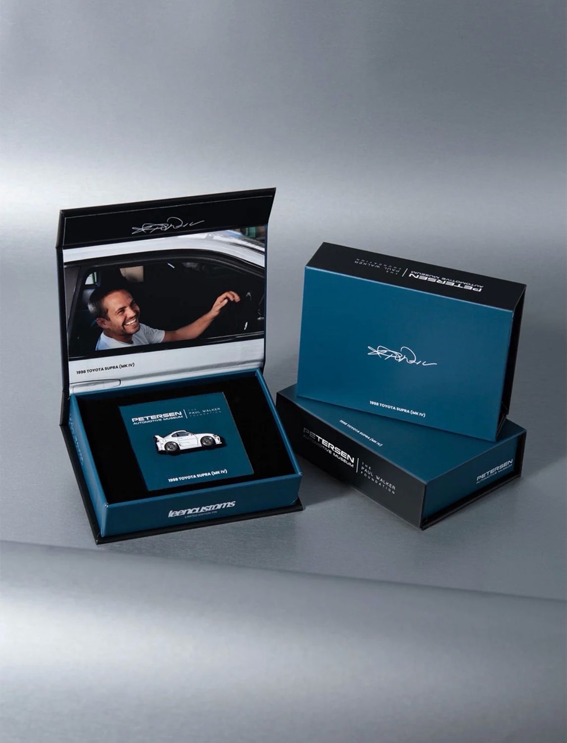[PREORDER] Paul Walker Foundation x PETERSEN x LEEN - 1998 Toyota Supra Commemorative Pin Box Set