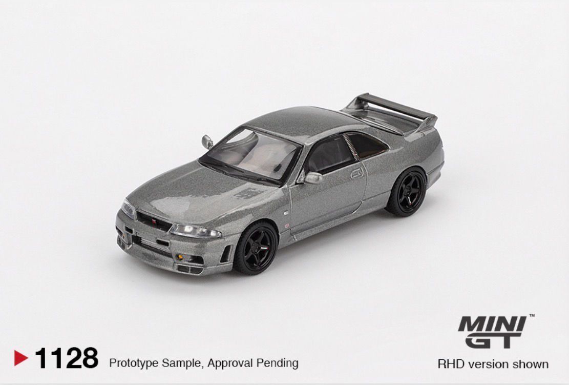 #1128 MINI GT Nissan Skyline GT-R Dark Metal Gray (NISMO BCNR33 CRS Version)