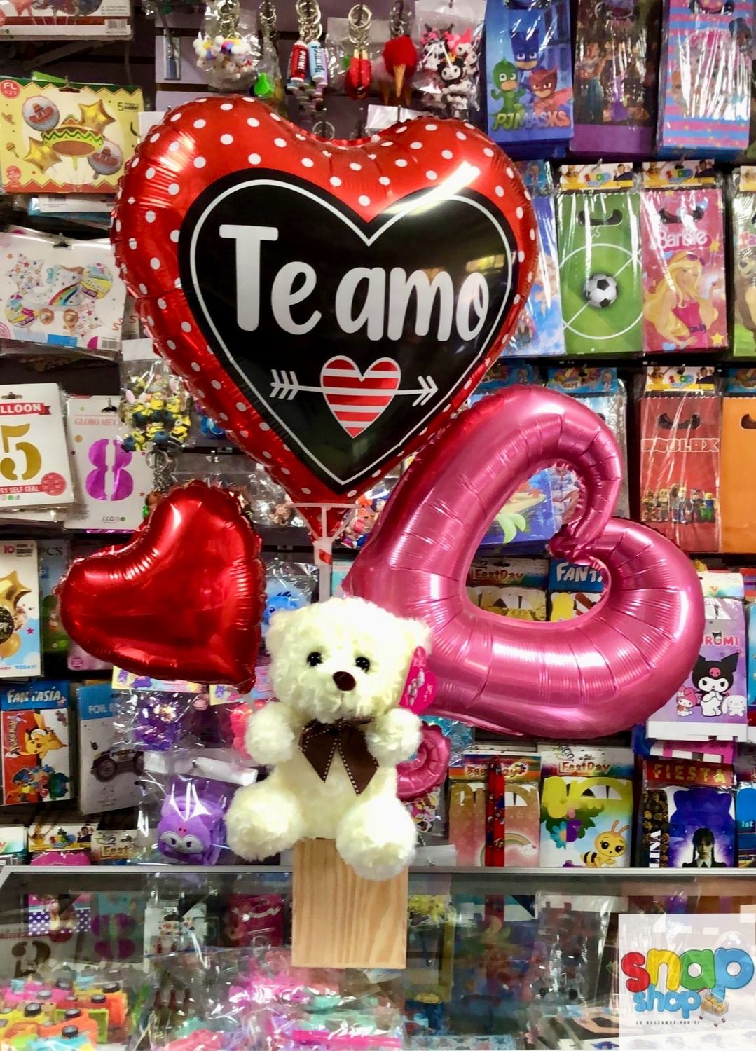 Arreglo de globos con peluche