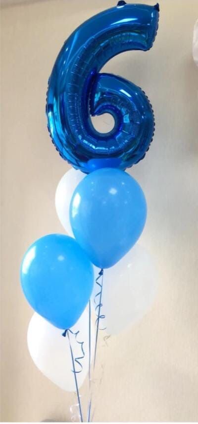 Arreglo de globos de número con helio