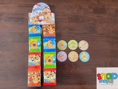 Paquete 16 sobres de tazos CapiBara