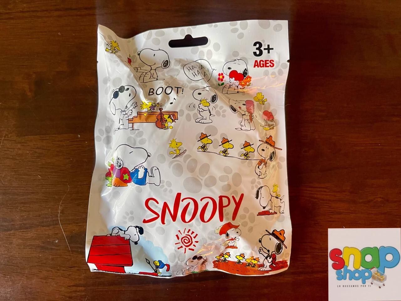 Sorpresa llavero peluche snoopy