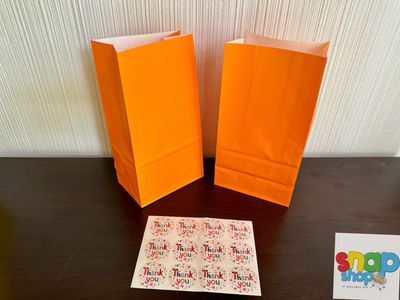 Paquete 12 bolsas para sorpresas Anaranjadas