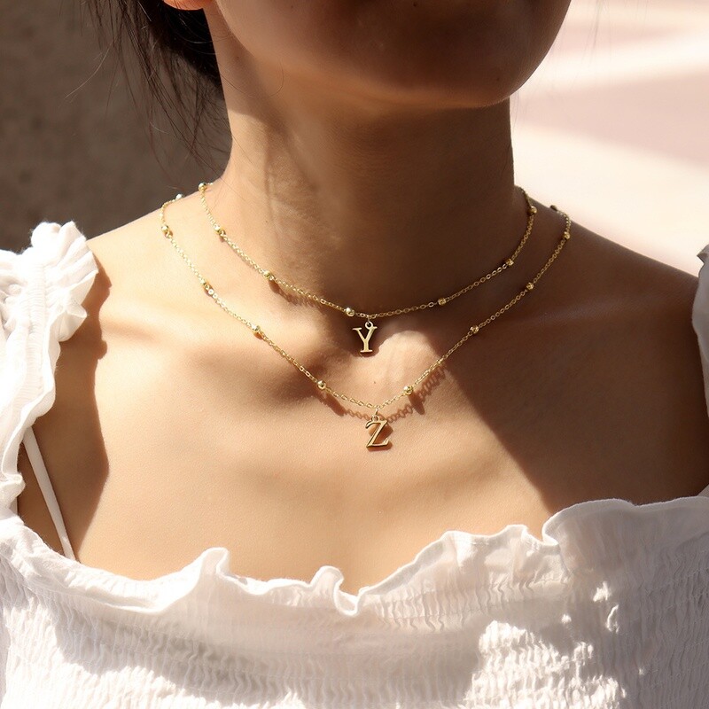 Collier avec pendentif en acier inoxydable pour femme, bijou classique avec 26 lettres initiales, couleur or, chaîne de perles
