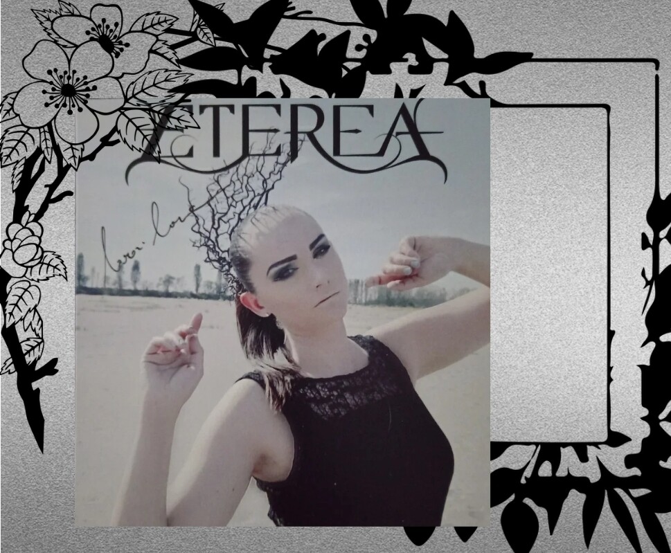 AN AUTOGRAPHED OFFICIAL ETEREA PIC