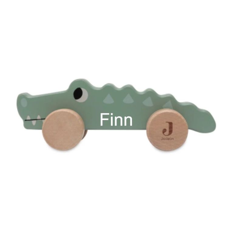 Houten krokodil op wielen