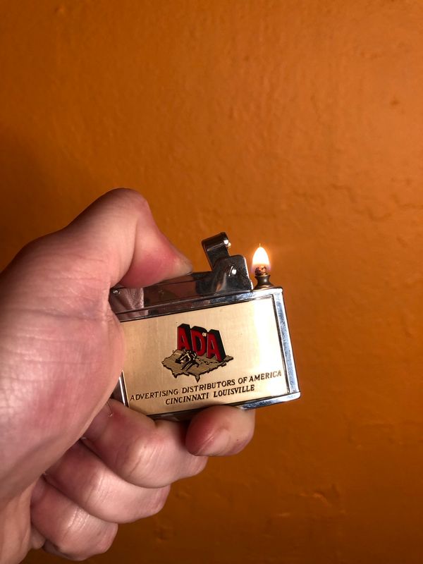 ADA Advertising Distributors Of America Ryan Brand Flat Advert Lighter