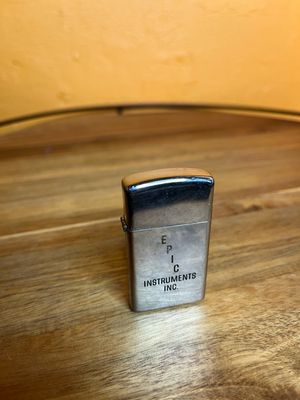 1975 Epic Instruments Inc Zippo Slim Lighter