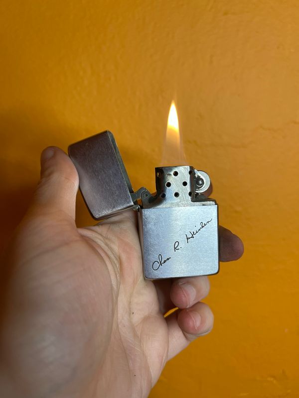 1960s Chas R Heinken Zippo Lighter