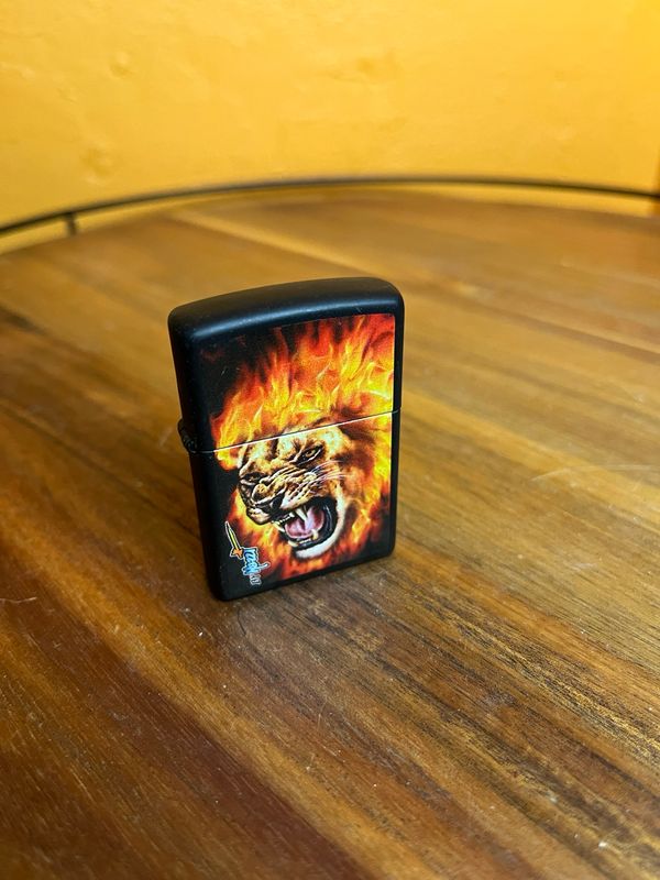 Flaming Lion Sealed Unstruck Zippo Lighter