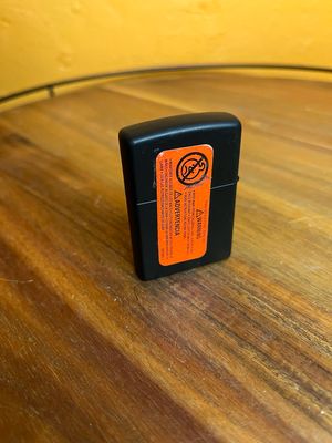 Flaming Lion Sealed Unstruck Zippo Lighter