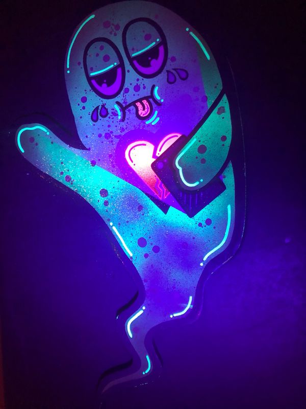 “Ghosted” by Mad Rabbit UV Reactive Painted Wood Decoration