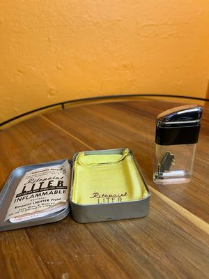 Leo’s General Contractor Ritepoint Shaker Clear Tank Lighter With Tin
