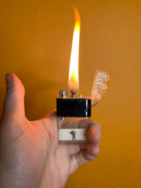 Elf Mascot Ritepoint Shaker Clear Tank Lighter With Tin