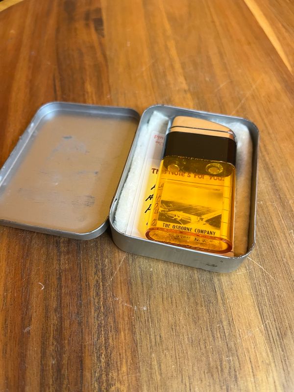 Ritepoint The Osborne Company Clifton NJ Photo Lighter Sample Clear Orange Tank Lighter With Tin