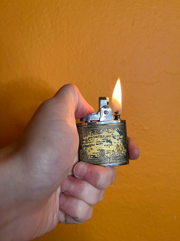 Crown Switzerland Map Souvenir Lighter