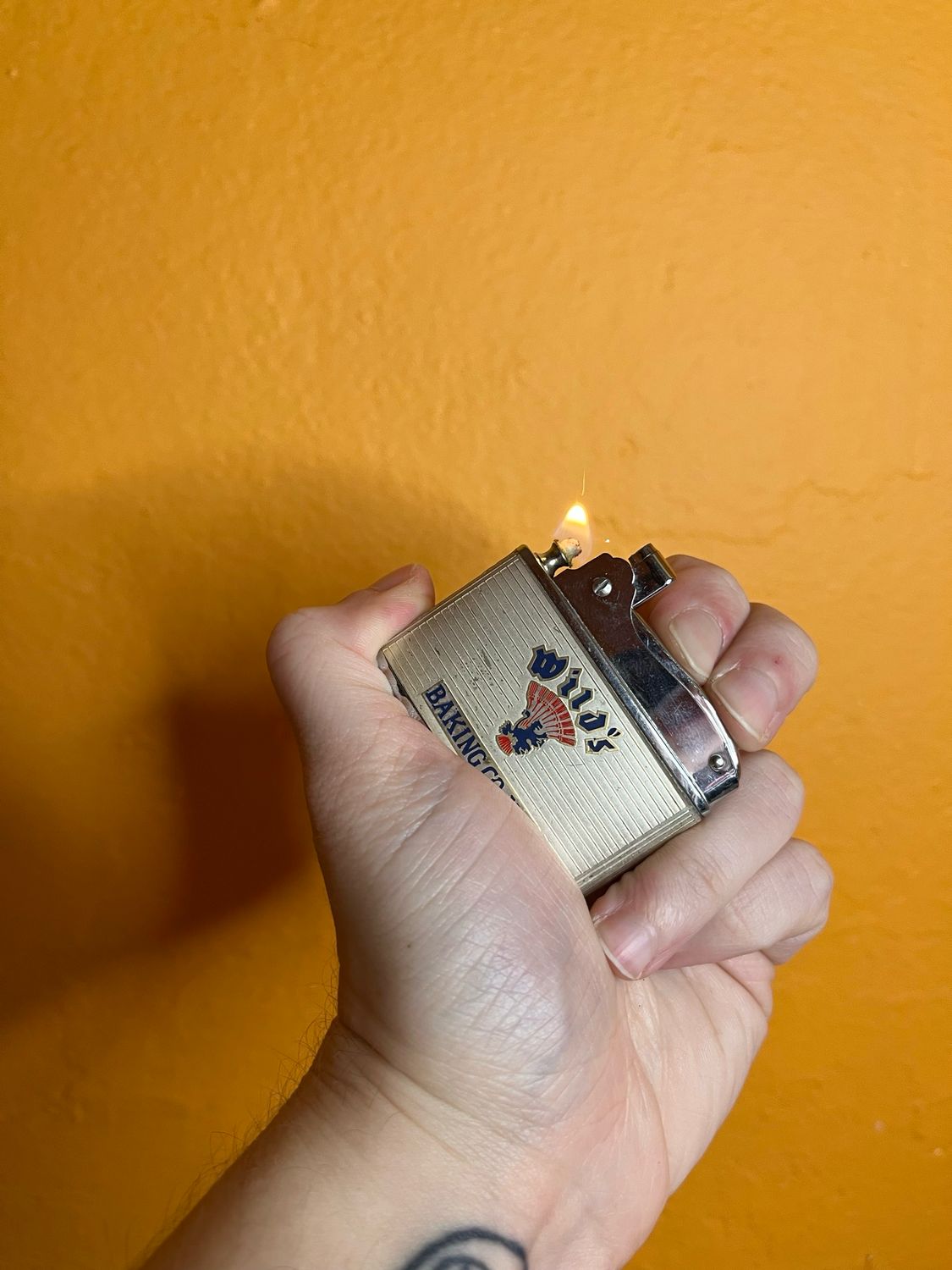 Wild’s Baking Compliments Of Carl Pfeifer Flat Lighter