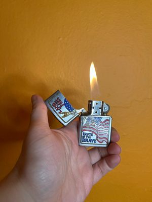 1996 Land Of The Free Home Of The Brave Clicklite Zippo Lighter