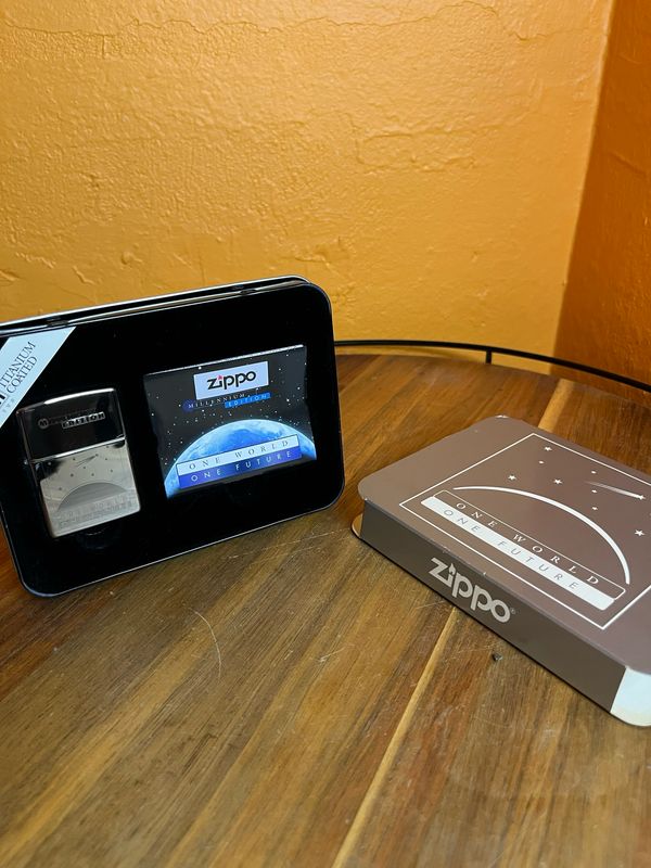 1999 One World One Future Millennium Edition Titanium Coated Sealed Unstruck Zippo Lighter