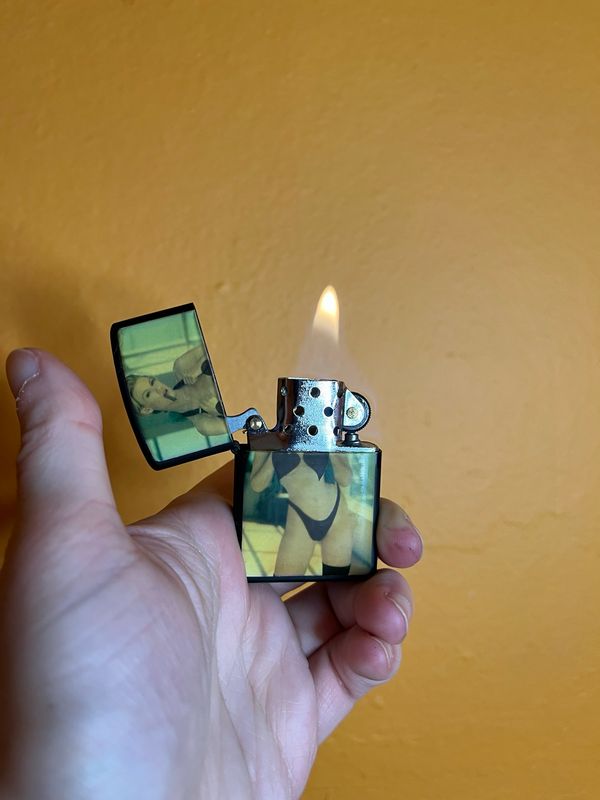 Censored Cigar Smoker Pinup Flip Top Lighter