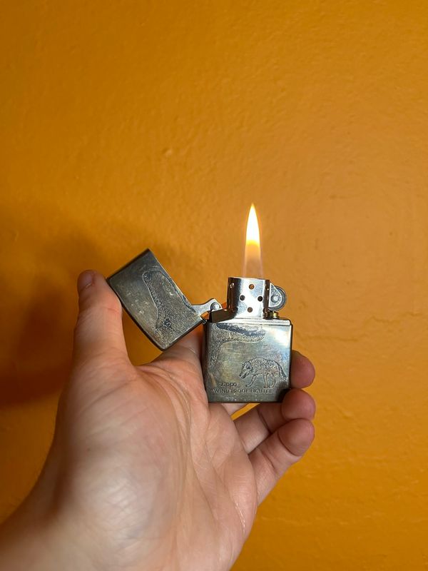 1997 Grey Wolf Uneven Tarnish Zippo Lighter