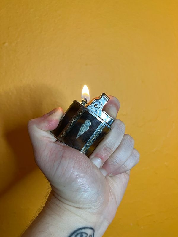 Wyoming Plumbing Supplies Tortoise Pattern Lighter