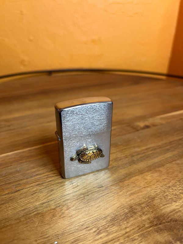 1999 Turtle Emblem Sealed Unstruck Zippo Lighter