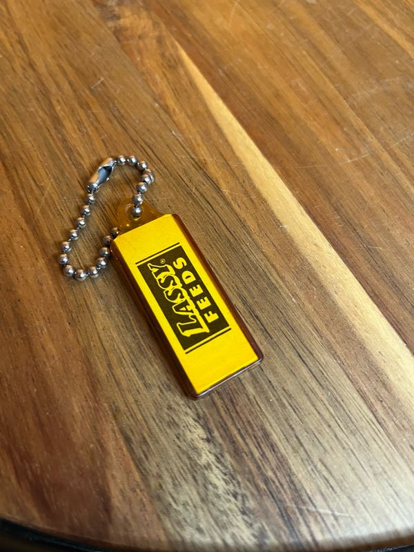 Lassy Feeds Pinup Keychain