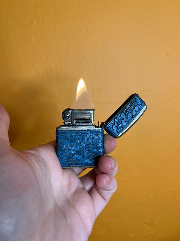 Melted Blue Sequins Champ-ette Austria Flip Top Lighter
