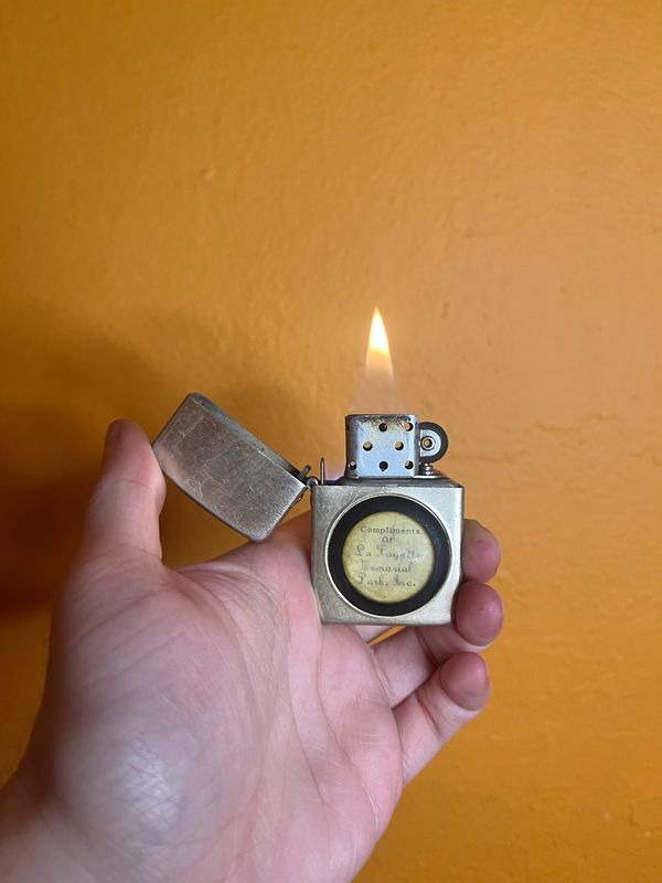 Compliments Of Lafayette Memorial Park Inc Storm King Flip Top Lighter