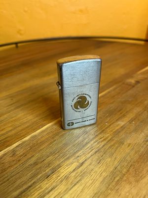 Merck Sharp &amp; Dohme Pharmaceuticals Slim Flip Top Lighter