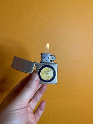 St Cyr &amp; Feenstra Amusement Co Newport NH Flip Top Lighter