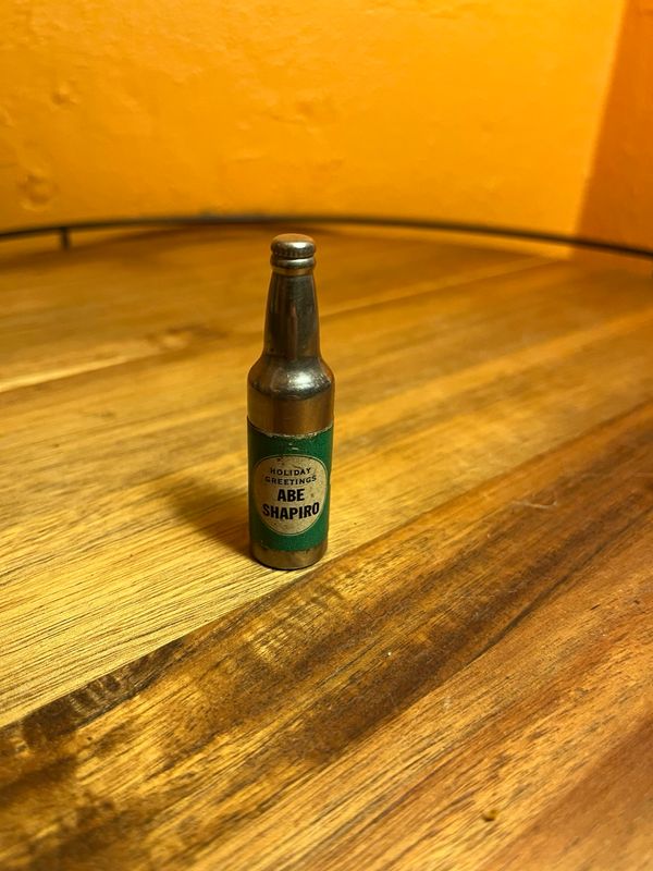 Holiday Greetings Abe Shapiro Phone 38 Warsaw NY Bottle Lighter