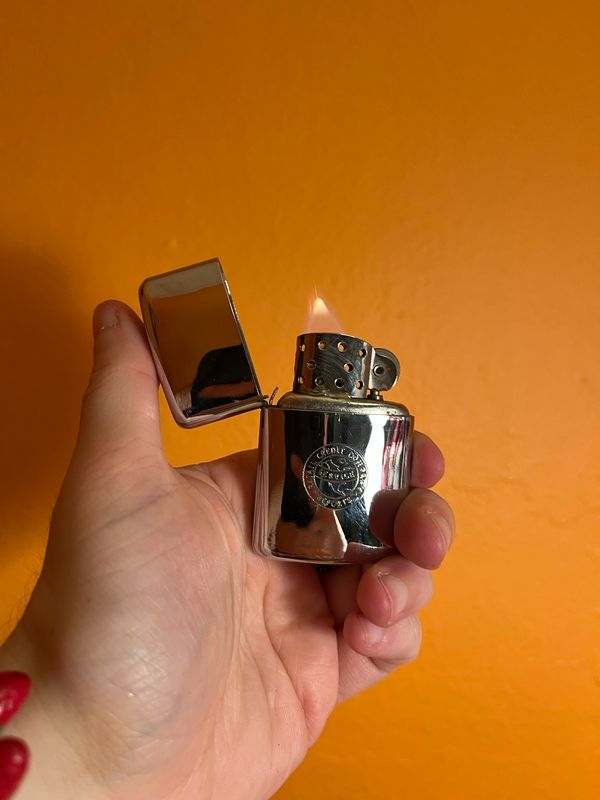 Retail Credit Company Reports Streamlite Flip Top Lighter