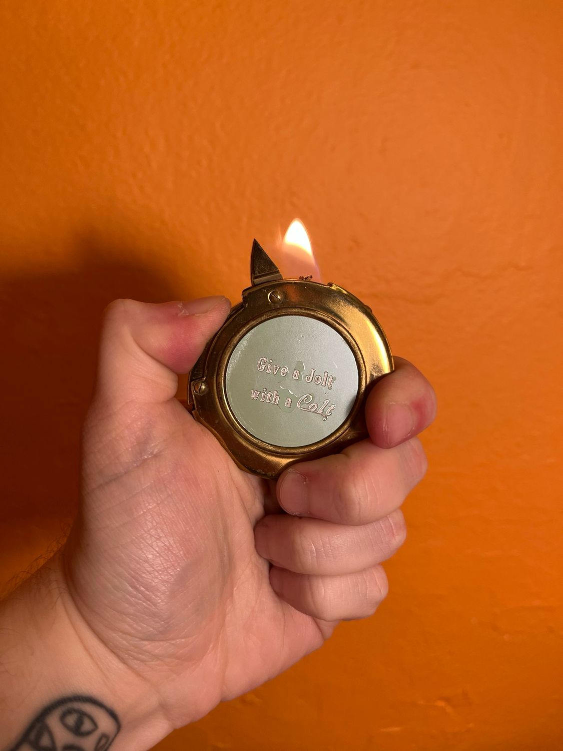 Give A Jolt With A Colt Mastercraft Musical Round Lighter