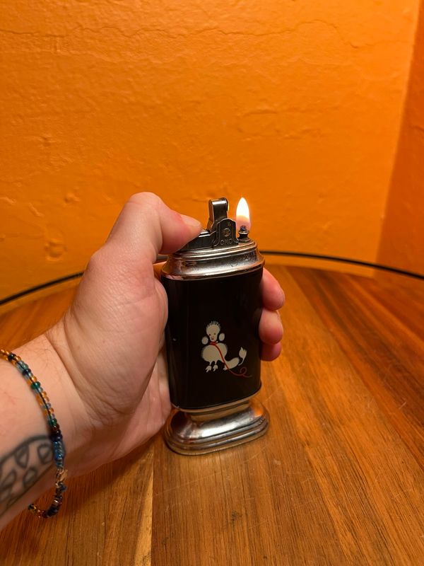 Man Faced Dog Poodle Table Lighter