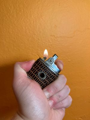 Missing Lens Peep Show Lighter