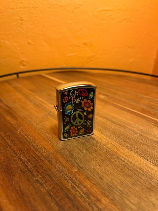 1990s AADLP Hippie Flip Top Lighter