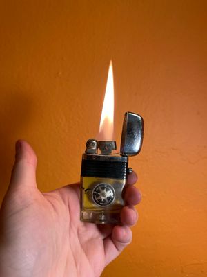 I’m A Wordpicker Moving Compass Scripto Lighter