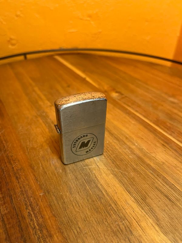 1956 Outboard Marine Dealer’s Luncheon Flip Top Lighter