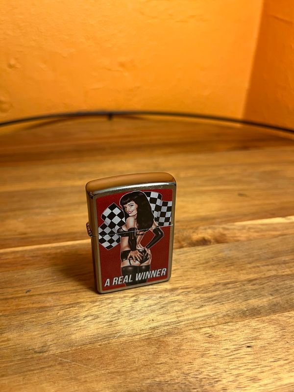 2022 A Real Winner Bettie Page Style Racing Pinup Sealed Unstruck Zippo Lighter