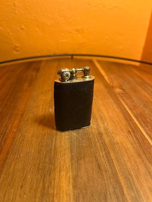 Early Evans Black Leather Lift Arm Lighter
