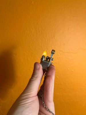 Elf Lift Arm Keychain Lighter
