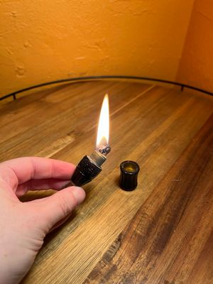 Damaged Coca Cola Bottle Lighter