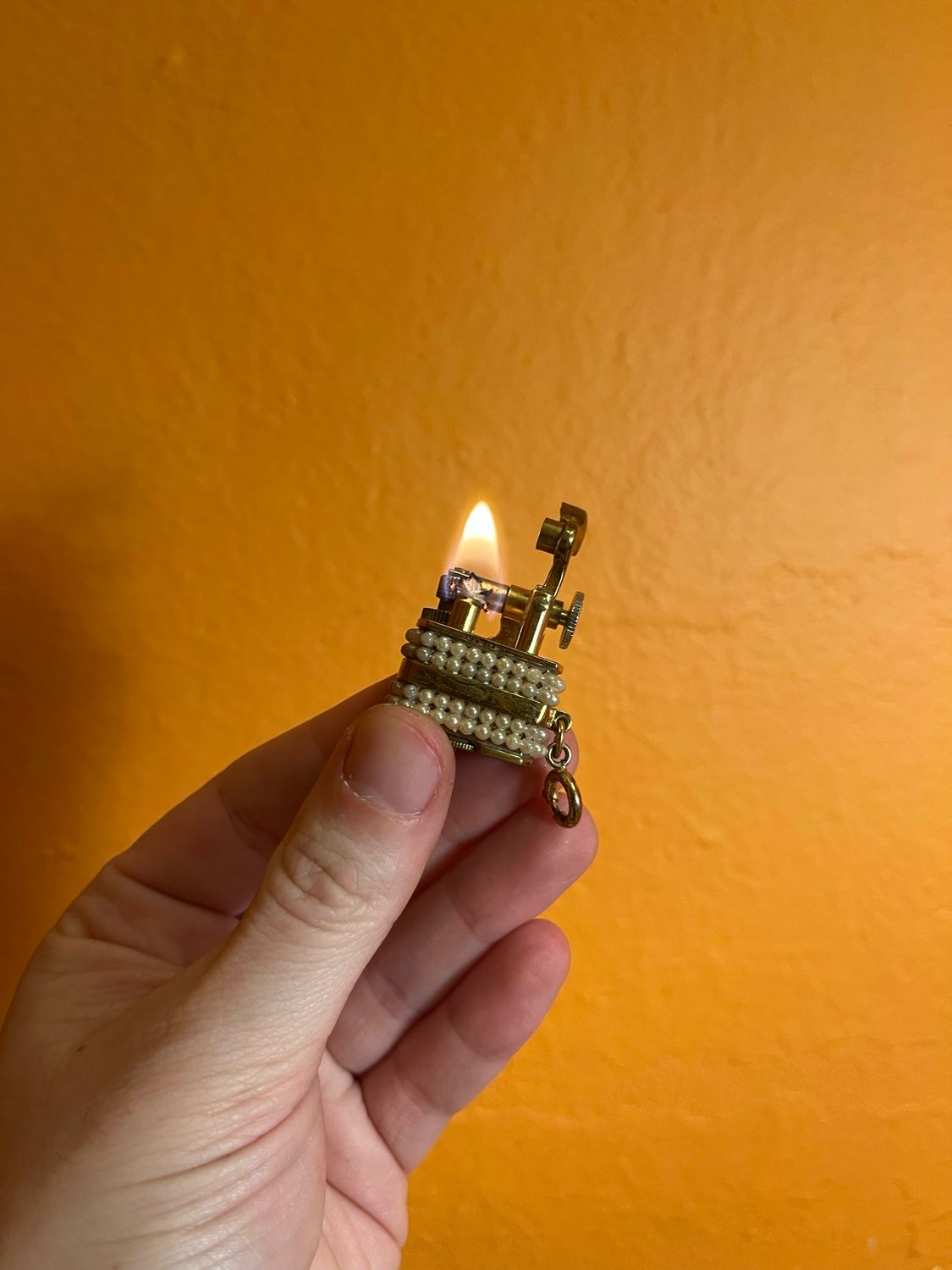 Golden Wheel Pearls Keychain Lighter