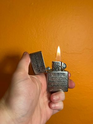 2013 Confucius Say Zippo Lighter