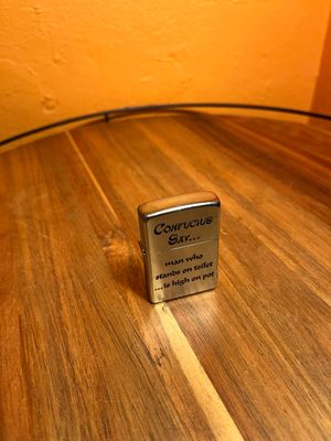 2013 Confucius Say Zippo Lighter
