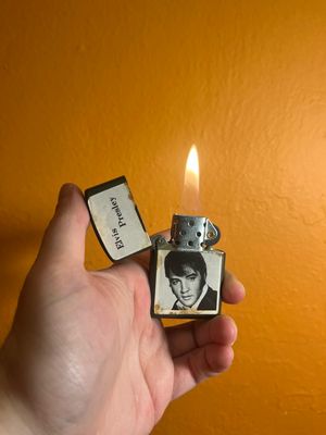 Worn Elvis Presley Flip Top Lighter