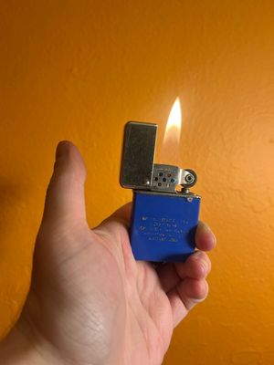 Worn Blue Flip Top Lighter